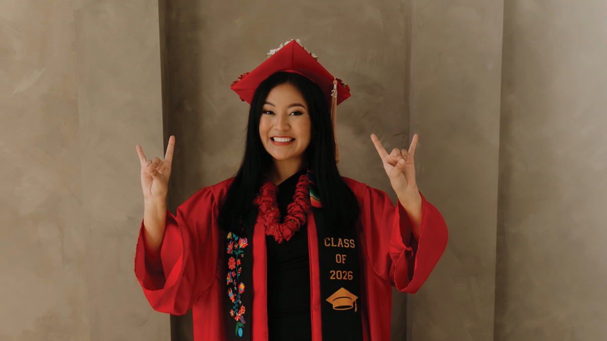 Image of Taya Perales in graduation regalia.