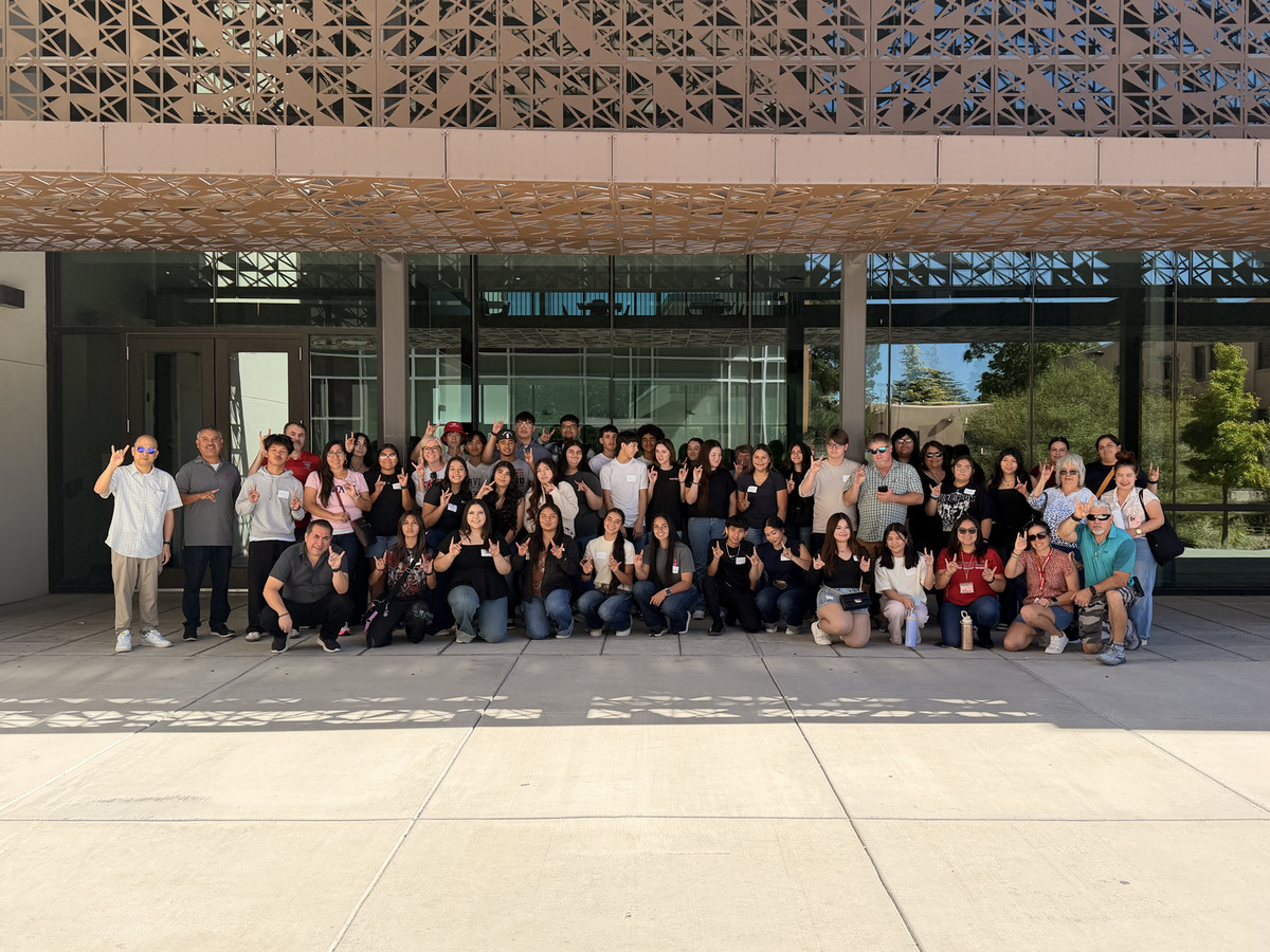 Group photo of Rural Student Connectivity Project in front of the McKinnon Center for Management